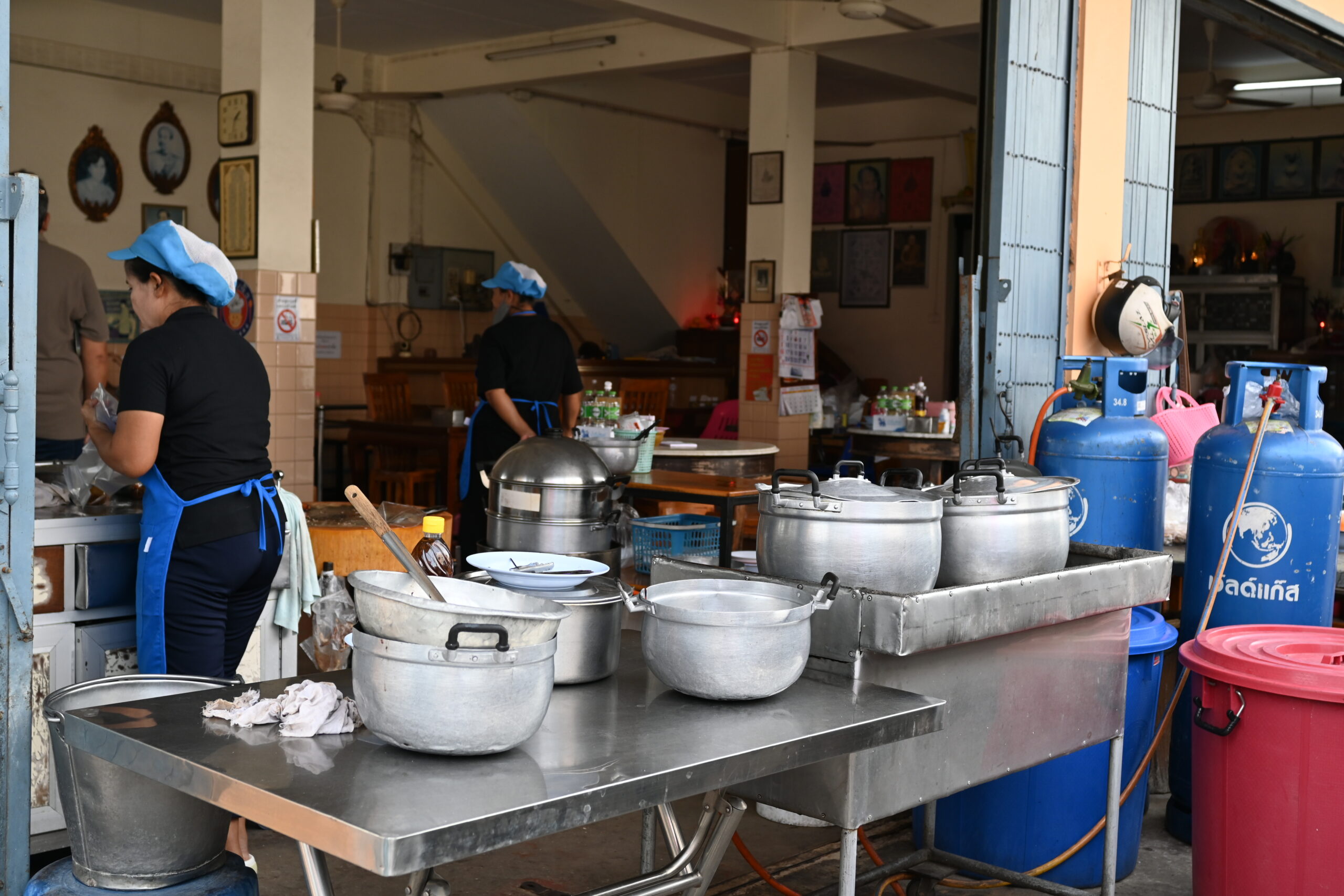 Hospitality staff working a busy overtime shift in a commercial kitchen