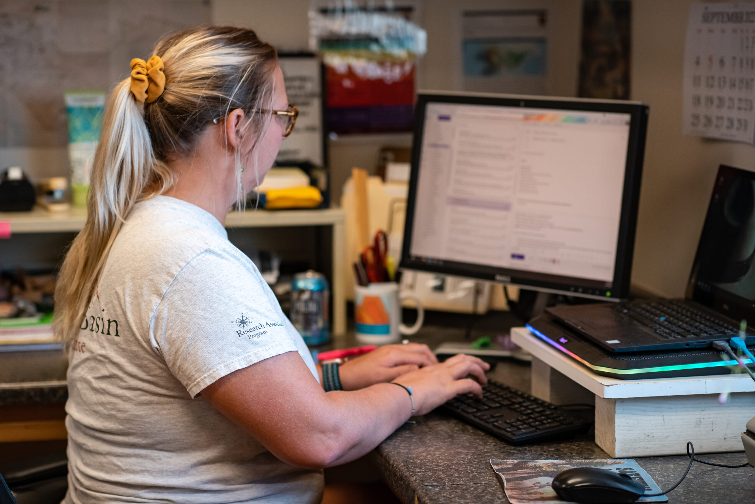 Person reviewing employment paperwork and terms at a desk